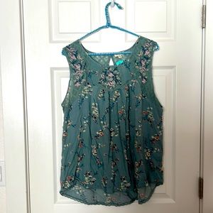 Sleeveless blouse. New with tags. XXL multi color.